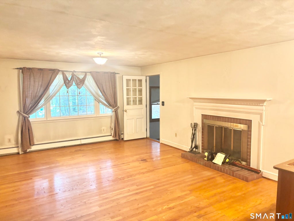 Photo of 49 Bolton Center Road, Manchester, CT 06040 (MLS # 24203703)
