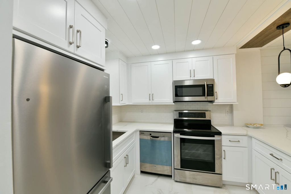 Photo of 41 S Main Street #51, Griswold, CT 06351 (MLS # 24151518)