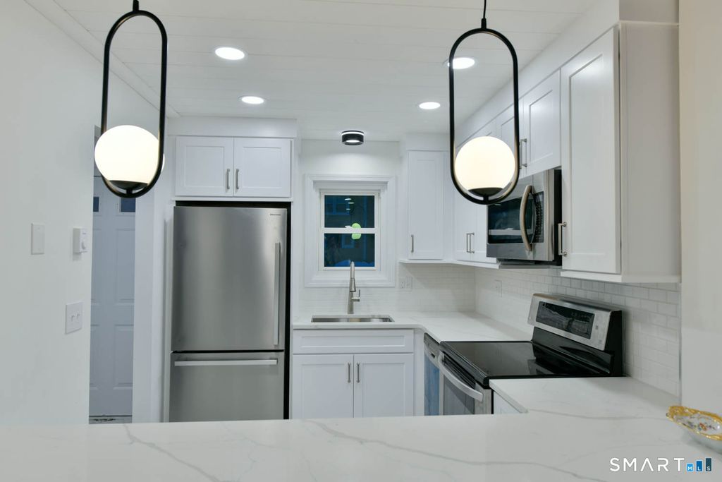 Photo of 41 S Main Street #51, Griswold, CT 06351 (MLS # 24151518)