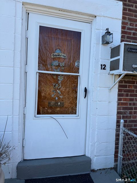 Photo of 12 Court C Court #Bdlg 61, Bridgeport, CT 06610 (MLS # 24164305)