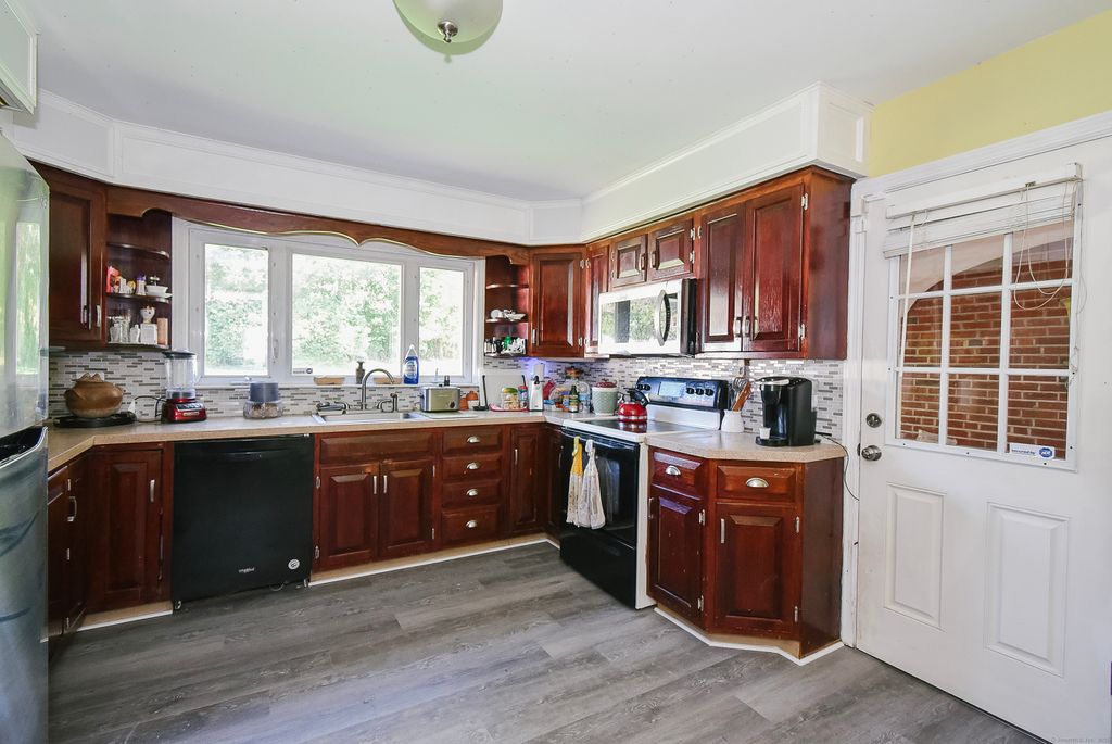Photo of 55 Barton Street, Torrington, CT 06790 (MLS # 24132697)