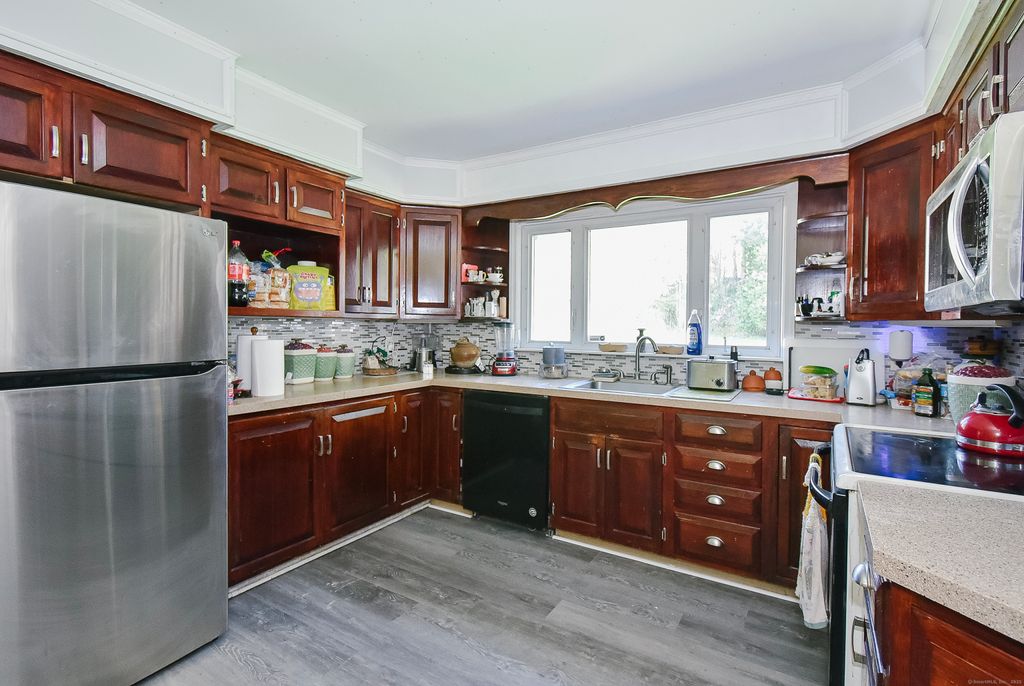 Photo of 55 Barton Street, Torrington, CT 06790 (MLS # 24132697)