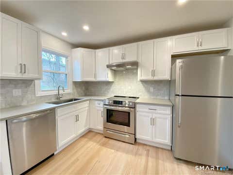 Photo of 56 Taylor Place, Fairfield, CT 06890 (MLS # 24201750)