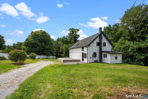 Photo of 199 Turkey Hills Road, East Granby, CT 06026 (MLS # 24195379)