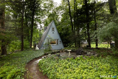 Photo of 50 W Woodland Drive, Lebanon, CT 06249 (MLS # 24196401)