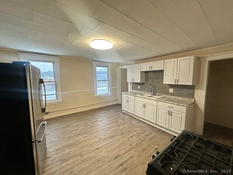 Rental Property at E Main Street 3, Torrington, Connecticut - Bedrooms: 3 
Bathrooms: 1 
Rooms: 6  - $2,100 MO.