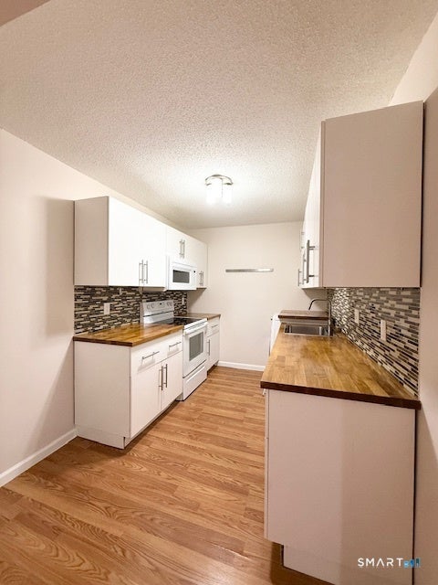 Tiny photo for 95 Woodsedge Drive #2C, Newington, CT 06111 (MLS # 24187414)
