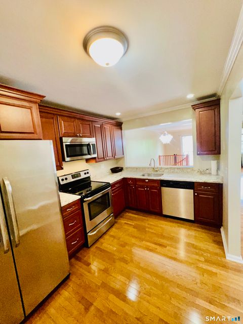 Photo of 55 Mill Plain Road #29-7, Danbury, CT 06811 (MLS # 24173673)
