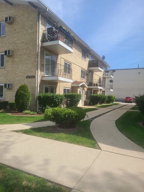 Photo of 6019 W 64th Place #23-4, Chicago, IL 60638 (MLS # 12480494)