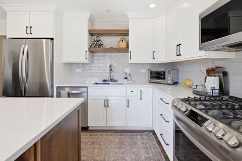 Tiny photo for 318 Dee Road, North Aurora, IL 60542 (MLS # 12569154)