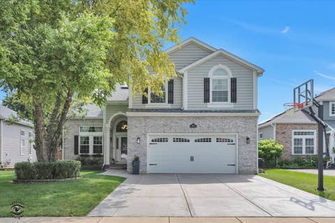 Photo of 9035 Westminster Drive, Woodridge, IL 60517 (MLS # 12700987)