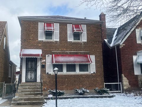 Photo of 10411 S Vernon Avenue, Chicago, IL 60628 (MLS # 12604576)