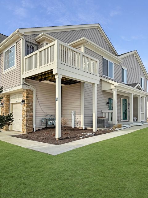 Photo of 7422 Chucks Way, Loves Park, IL 61111 (MLS # 12568077)