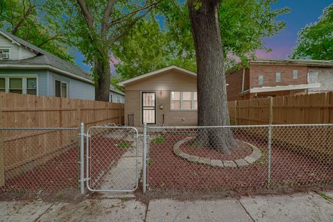 Photo of 255 W 117th Street, Chicago, IL 60628 (MLS # 12446428)