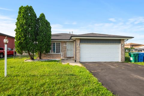 Photo of 928 E 153rd Street, Phoenix, IL 60426 (MLS # 12493308)