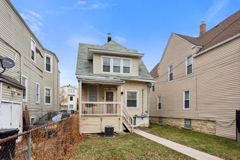 Photo of 5925 W Iowa Street, Chicago, IL 60651 (MLS # 12611207)