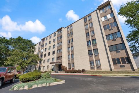 Photo of 9720 S Pulaski Road #502, Oak Lawn, IL 60453 (MLS # 12441544) Photo of 9720 S Pulaski Road #502, Oak Lawn, IL 60453 (MLS # 12441544)