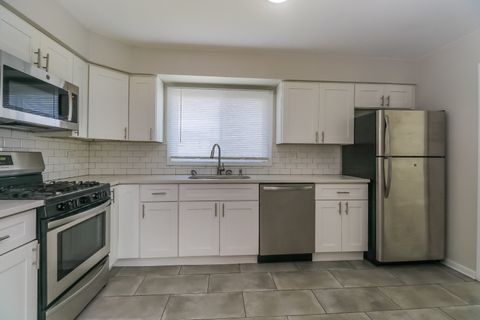 Tiny photo for 923 Division Street, Melrose Park, IL 60160 (MLS # 12399425)