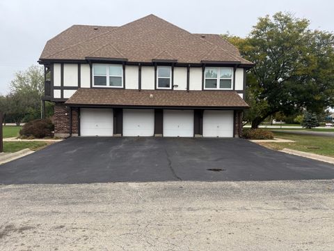 Photo of 1642 Country Lakes Drive #A, Naperville, IL 60563 (MLS # 12496934)