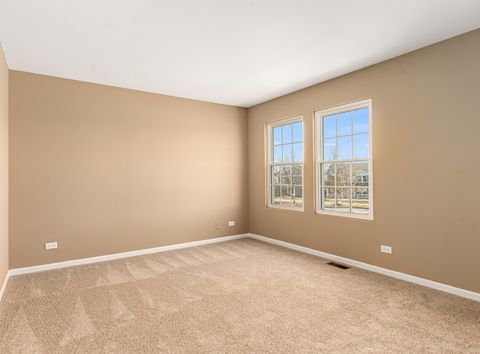 Tiny photo for 322 OGDEN FALLS Boulevard #322, Oswego, IL 60543 (MLS # 12544728)