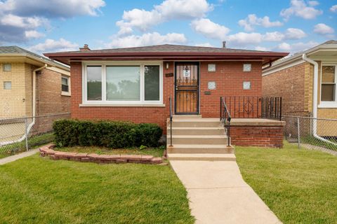 Photo of 9747 S Harvard Avenue, Chicago, IL 60628 (MLS # 12502963)