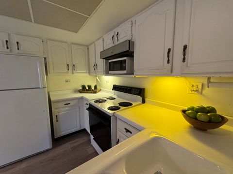 Tiny photo for 1974 Wexford Circle #123, Wheaton, IL 60189 (MLS # 12513071)