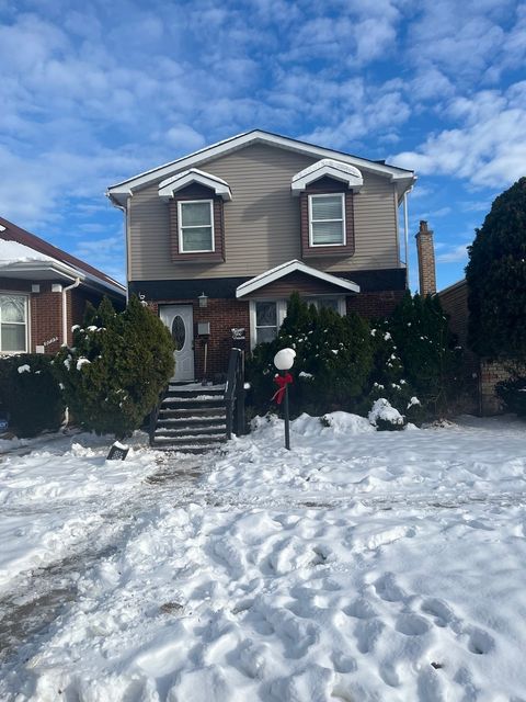 Photo of 9737 S Calumet Avenue, Chicago, IL 60628 (MLS # 12528690)