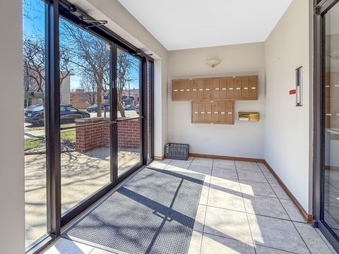 Tiny photo for 5840 W Lawrence Avenue #301, Chicago, IL 60630 (MLS # 12598297)