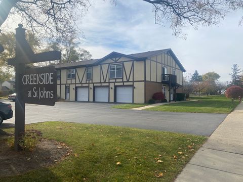 Photo of 404 Saint Johns Road #C, Woodstock, IL 60098 (MLS # 12510533)