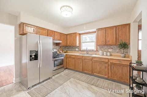 Tiny photo for 18515 Oakley Avenue, Lansing, IL 60438 (MLS # 12720340)