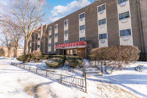 Photo of 10015 Beverly Drive #404, Skokie, IL 60076 (MLS # 12555282)