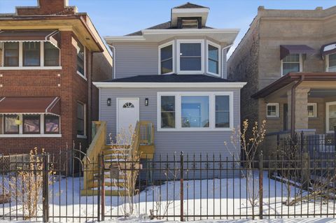 Photo of 821 N Lockwood Avenue, Chicago, IL 60651 (MLS # 12562401)