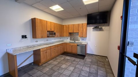 Tiny photo for 831 Oakton Street #831-837, Elk Grove Village, IL 60007 (MLS # 12524997)