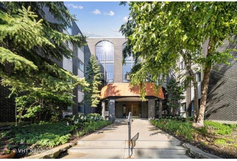 Photo of 9530 Lamon Place #407, Skokie, IL 60077 (MLS # 12669973)
