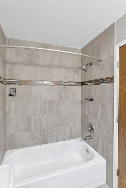 Tiny photo for 379 Ascot Lane, Streamwood, IL 60107 (MLS # 12651332)