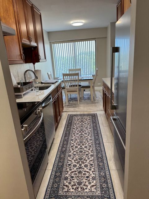 Tiny photo for 7141 N Kedzie Avenue #403, Chicago, IL 60645 (MLS # 12460313)