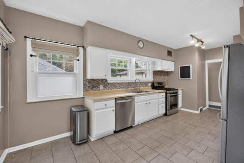 Tiny photo for 327 McClellan Boulevard, Davenport, IA 52803 (MLS # 12726463)