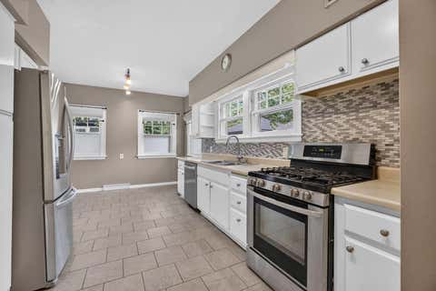 Tiny photo for 327 McClellan Boulevard, Davenport, IA 52803 (MLS # 12726463)