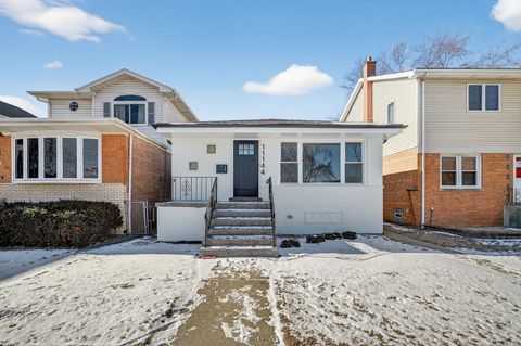 Photo of 11144 S Troy Street, Chicago, IL 60655 (MLS # 12548631)