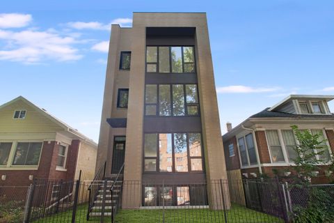 Photo of 4920 N WHIPPLE Street #1, Chicago, IL 60625 (MLS # 12488911)