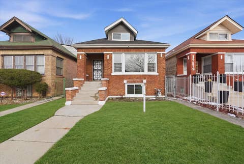 Photo of 7517 S CARPENTER Street, Chicago, IL 60620 (MLS # 12738051)
