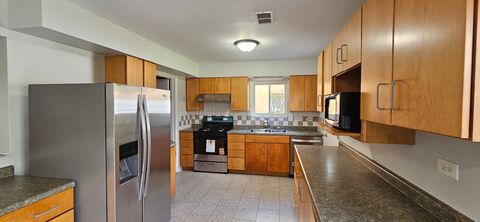 Tiny photo for 9449 Dee Road, Des Plaines, IL 60016 (MLS # 12609939)