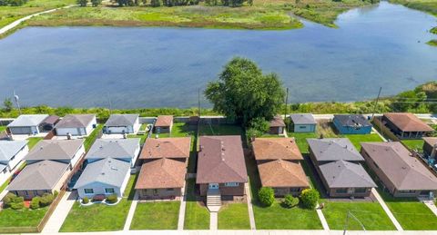 Tiny photo for 13921 S Manistee Avenue, Burnham, IL 60633 (MLS # 12509370)