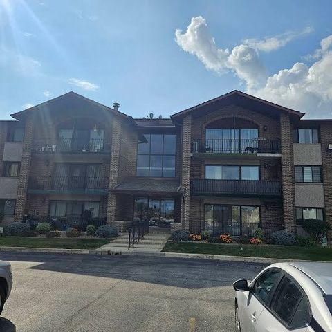 Photo of 9051 S Roberts Road #102, Hickory Hills, IL 60457 (MLS # 12484141)