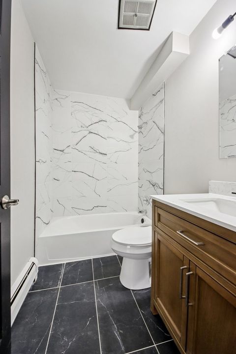 Tiny photo for 1111 Bloomingdale Road #2A, Glendale Heights, IL 60139 (MLS # 12563105)