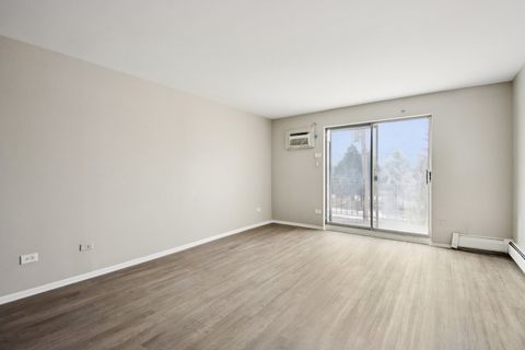 Tiny photo for 1111 Bloomingdale Road #2A, Glendale Heights, IL 60139 (MLS # 12563105)