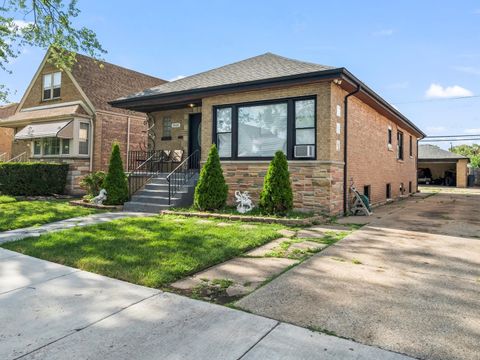 Photo of 3434 W 71st Place, Chicago, IL 60629 (MLS # 12517351)