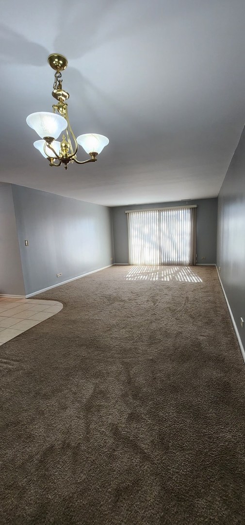 7730 Dempster Street 209