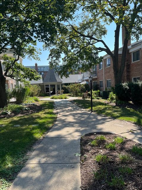 Tiny photo for 543 Burlington Avenue #112E, Downers Grove, IL 60515 (MLS # 12482684)