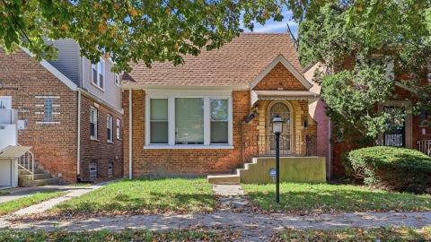 Photo of 10054 S Saint Lawrence Avenue, Chicago, IL 60628 (MLS # 12778355)
